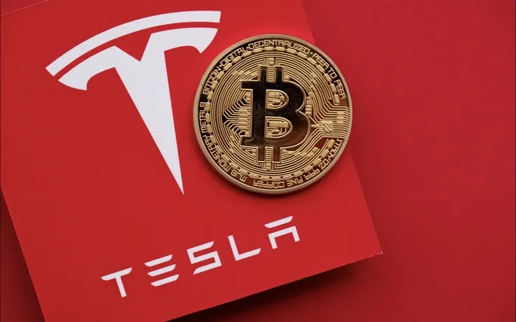 Giá Bitcoin hôm nay 23/07/2026 dao động quanh 65.764 USD khi Tesla tiếp tục nắm giữ 11.509 BTC và thị trường theo dõi tiến trình Đạo luật CLARITY tại Mỹ.